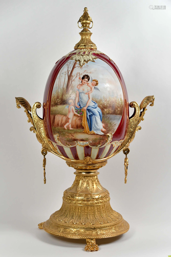 Painted porcelain and gilded metal egg