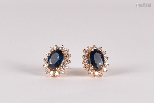 18 kt yellow gold earings set with sapphires and