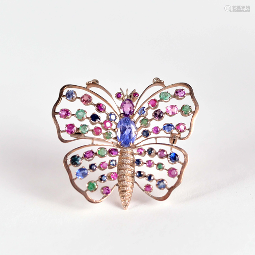 10 kt gold butterfly brooch set with rubies, emeralds