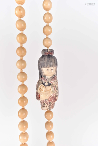 Japanese bone necklace with geisha