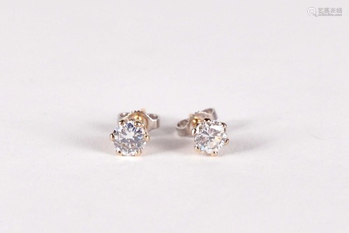 14kt white gold earings set with diamonds