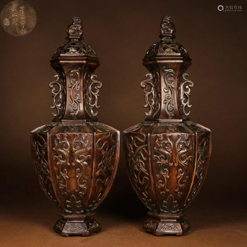 PAIR OF CHENXIANG WOOD AUSPICIOUS PATTERN VASES