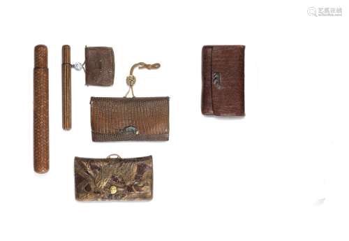 Three leather tabako-ire (tobacco pouches) and two kiseruzut...