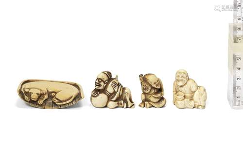 Three ivory and one stag-antler netsuke One by Masatomo, lat...