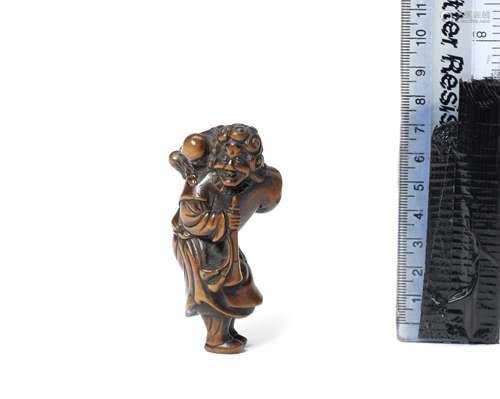 A wood netsuke of a Dutchman 18th century