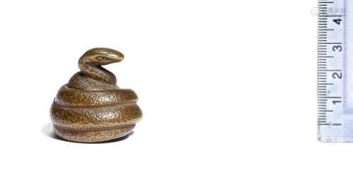 A boxwood netsuke of a snake By Sari, early 19th century