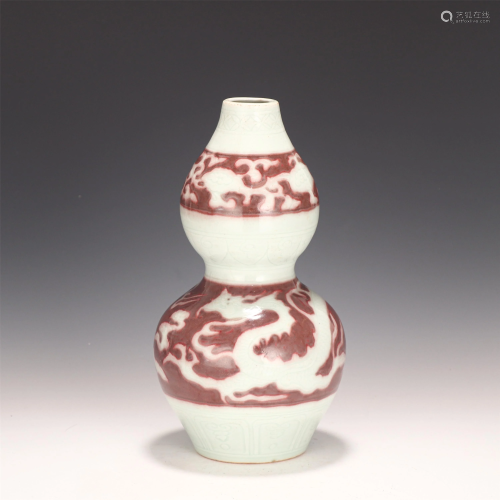 A CHINESE UNDERGLAZE RED PORCELAIN DOUBLE-GOURDS VASE