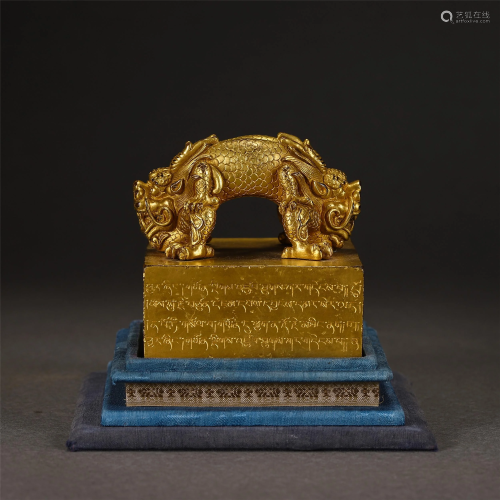 A CHINESE INSCRIBED GILT BRONZE BEAST SEAL
