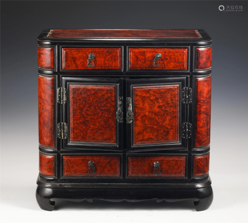 A CHINESE MULTI-HARDWOODS CARVED CABINET