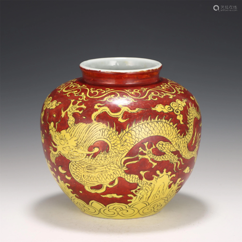 A CHINESE RED-GROUND YELLOW DRAGON-CLOUD PORCELAI…