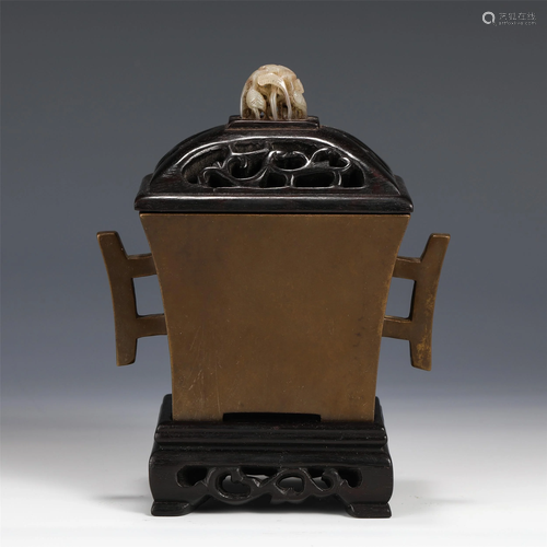 A CHINESE BRONZE INCENSE BURNER WITH DOUBLE HANDLES