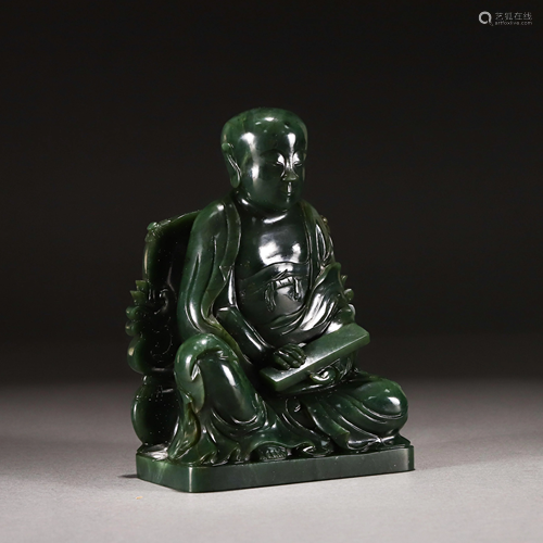 A CHINESE JASPER CARVED SEATED FIGURINE OF BUDDHA