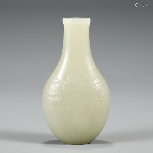 A CHINESE JADE CARVED VASE