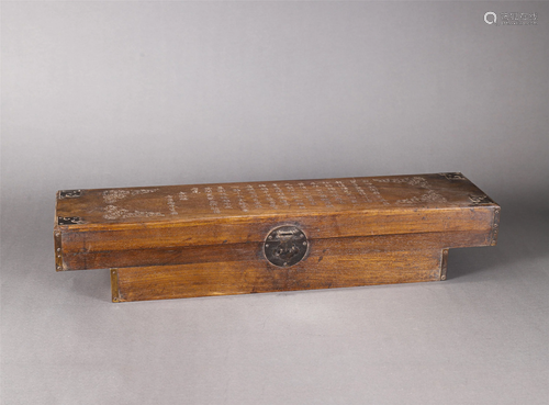 A CHINESE WOODEN LIDDED BOX WITH INSCRIPTIONS