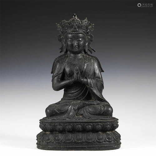 A CHINESE BRONZE SEATED FIGURINE OF BUDDHA