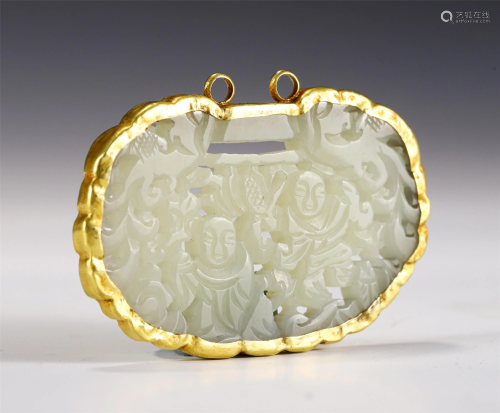 A CHINESE GILT SILVER MOUNTED JADE FIGURAL PENDANT