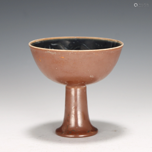 A CHINESE BROWN GLAZED INNER INCISED DRAGON STEM CUP