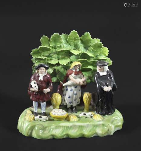 STAFFORDSHIRE PEARLWARE 'PIG TYTHE' GROUP an early 19thc gro...