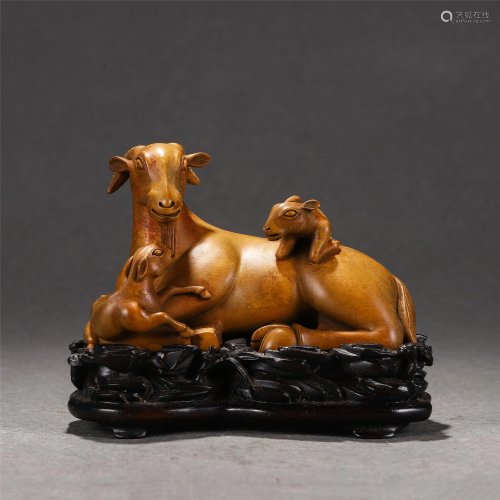 A CHINESE HARDWOOD CARVED THREE-SHEEP DECORATION