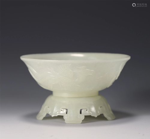 A CHINESE JADE CARVED PHOENIX BOWL AND STAND