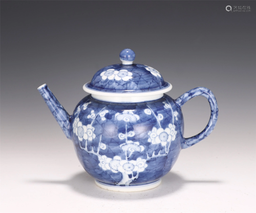 A CHINESE BLUE GROUND WHITE PLUM PORCELAIN TEA POT