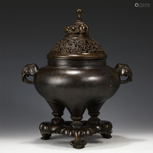 A CHINESE BRONZE INCENSE BURNER WITH ELEPHANT HANDLES