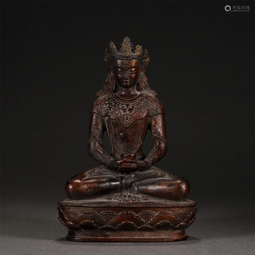 A CHINESE ILLUMINATED BRONZE SEATED FIGURINE OF BUDD…