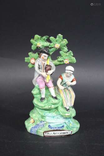 PEARLWARE GROUP - 'VILLAGE GROUP' an early 19thc figure grou...