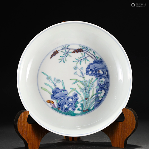 A CHINESE DOU-CAI GLAZED FLOWERS AND ROCKS PORCELAIN