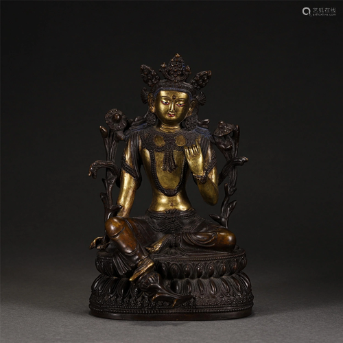 A CHINESE GILT BRONZE SEATED FIGURINE OF BUDDHA