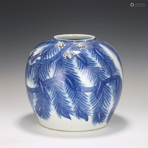 A CHINESE BLUE AND WHITE PORCELAIN JAR WITH CARVED