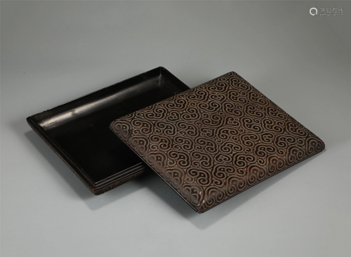 A CHINESE CARVED LACQUER RECTANGULAR BOX AND COVER