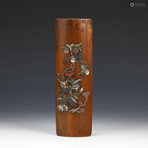 A CHINESE POLYCHROME FLORAL BAMBOO ARM REST