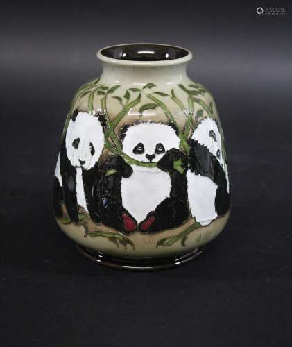 MOORCROFT VASE - THE FAMILY a modern vase painted with vario...