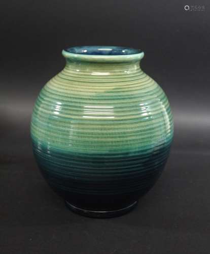 WILLIAM MOORCROFT VASE a large ribbed vase in shades of gree...