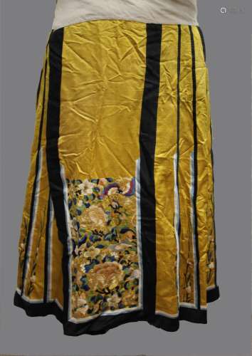 CHINESE SILK EMBROIDERED SKIRT late 19thc/early 20thc, a yel...