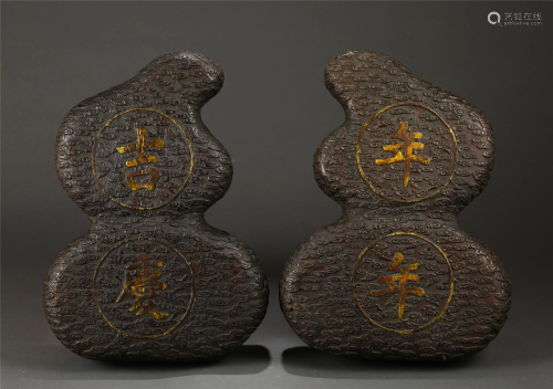 A PAIR OF CHINESE CHENXIANG WOOD DOUBLE-GOUR…