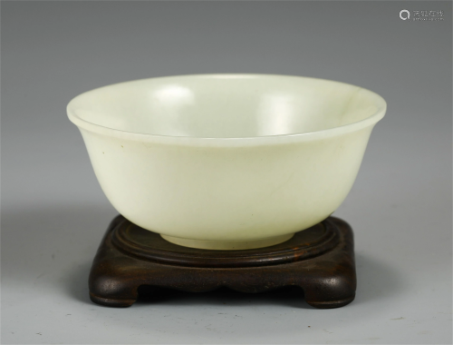 A CHINESE CARVED JADE BOWL