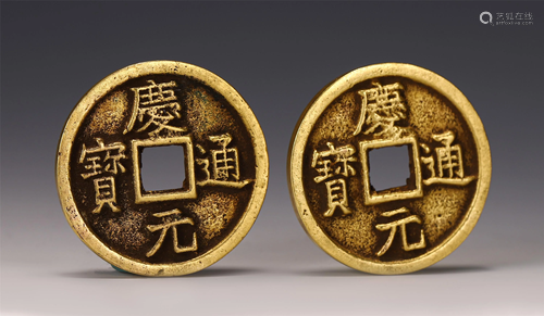 A PAIR OF CHINESE GILDING COINS