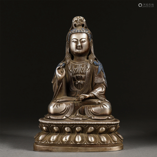 A CHINESE SILVER SEATED FIGURINE OF BUDDHA GUANYIN