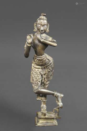 INDIAN BRONZE KRISHNA an Indian bronze figure of Krishna the...