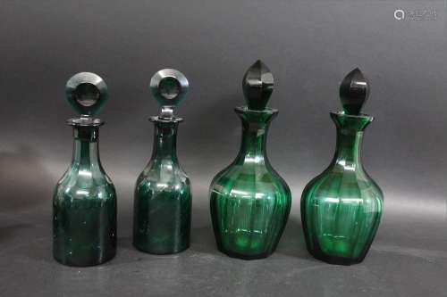 A PAIR OF 19THC GREEN GLASS DECANTERS a pair of glass decant...