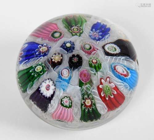 CLICHY GLASS PAPERWEIGHT A Clichy weight with a variety of f...