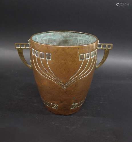 WMF TWIN HANDLED VASE a large copper hand beaten vase with s...