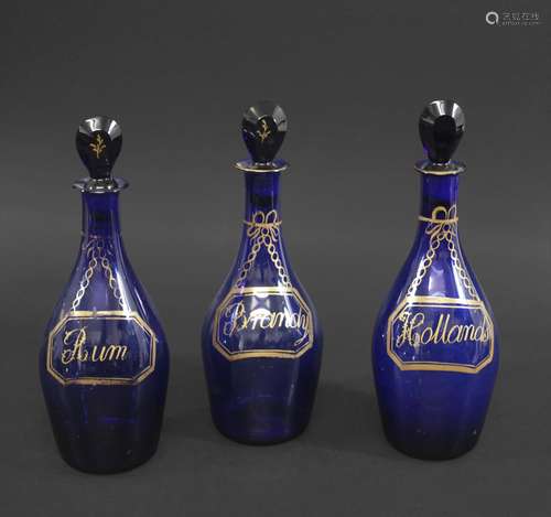 19THC BRISTOL BLUE GLASS DECANTERS a set of three similar gl...