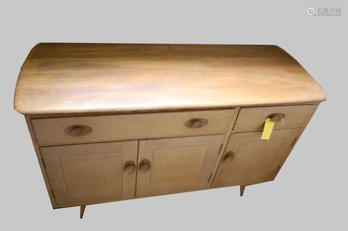 ERCOL SIDEBOARD Model No 351, a light elm and beech sideboar...