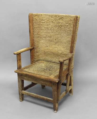 CHILD'S ORKNEY CHAIR with a pine frame and woven curved back...