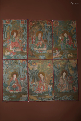 A EIGHTEEN ARHATS THANGKA.