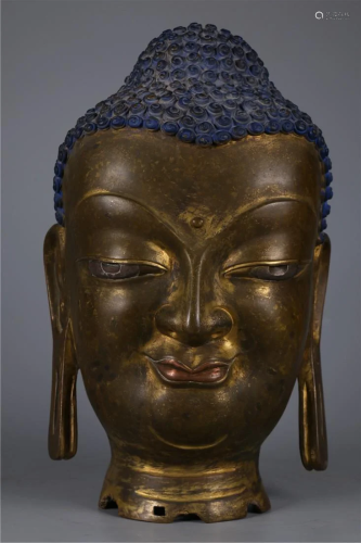 A GILT BRONZE BUDDHA HEAD BUST SCULPTURE