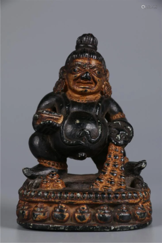 A STONE SCULPTED BUDDHA STATUE